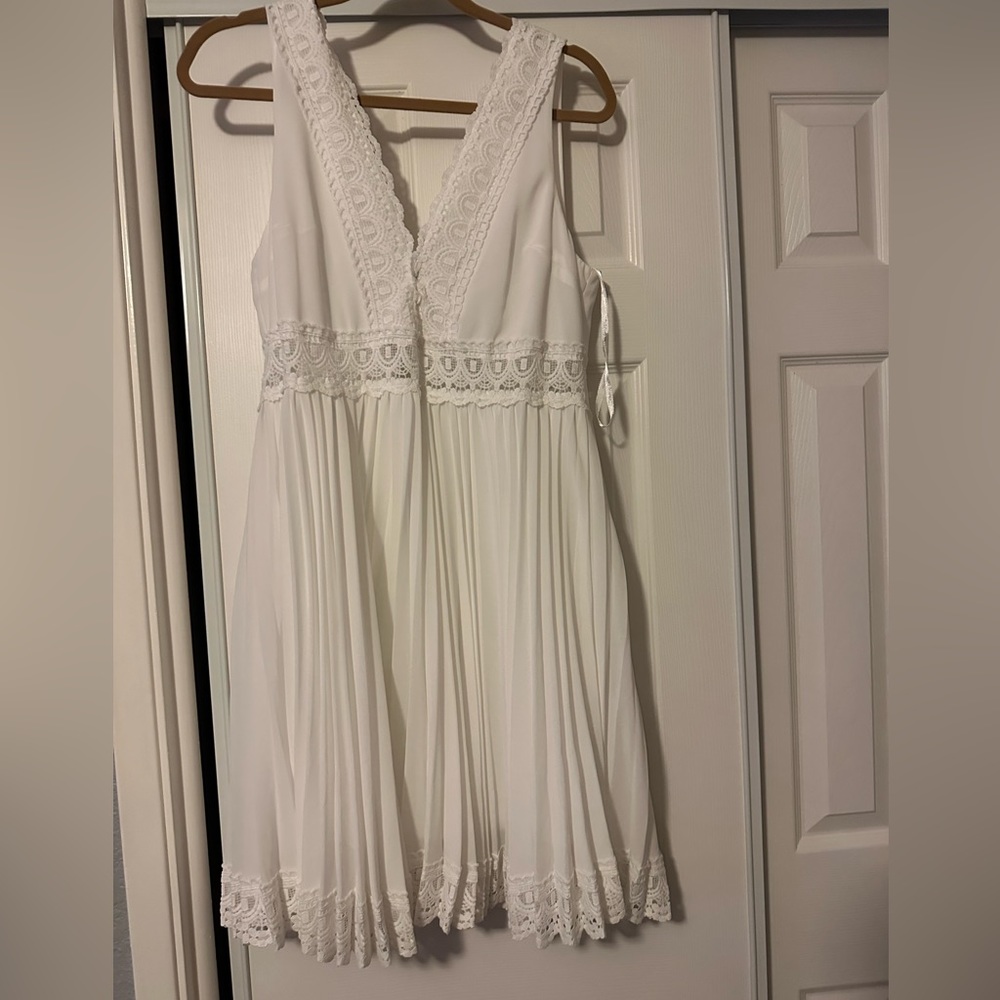 Super cute white dress from local boutique Envy size L